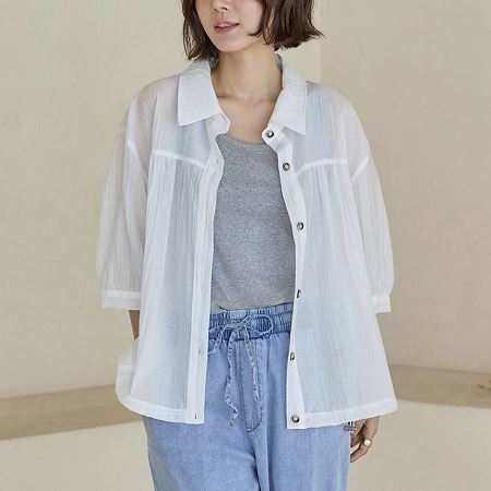 A selection of Dongdaemum Women’s Shirts & Tops, showcasing the best of Korean fashion.