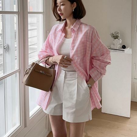 A selection of Dongdaemum Women’s Shirts & Tops, showcasing the best of Korean fashion.