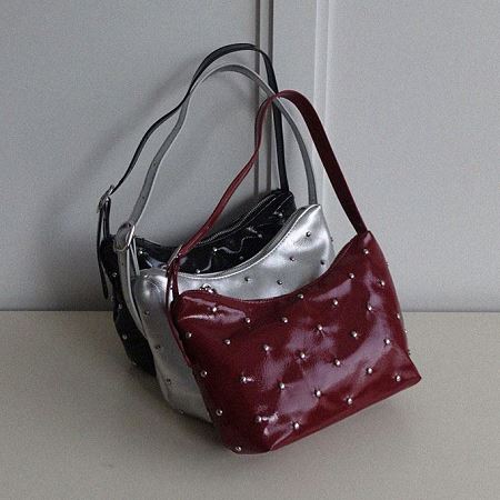 A collection of Dongdaemum Women’s Handbags, Wallets & Cases, showcasing the elegance of Korean fashion.