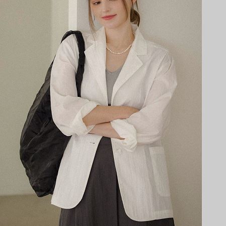 A variety of Dongdaemum Women’s Coats & Jackets, reflecting the sophistication of Korean fashion.