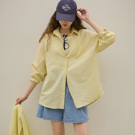 Dongdaemum Women’s Shirts, Tops & T-Shirts, a testament to the elegance and quality of wholesale Korean fashion.