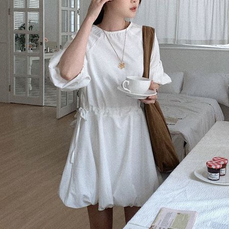 A collection of Dongdaemum Women’s Dresses, encapsulating the charm of Korean fashion.