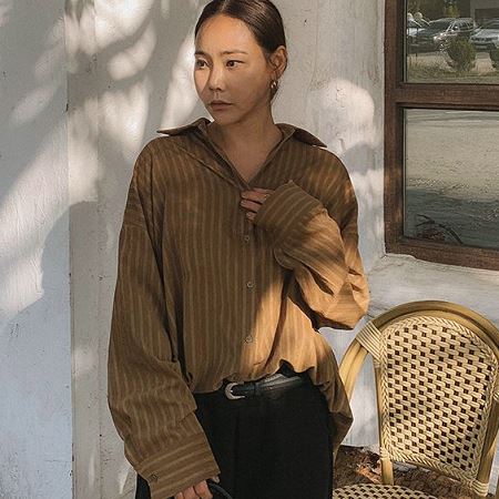 A selection of Dongdaemum Women’s Shirts & Tops, showcasing the best of Korean fashion.