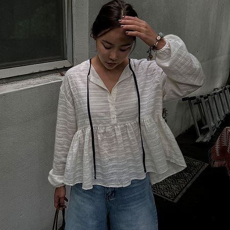 Dongdaemum Women’s Shirts, Tops & T-Shirts, a testament to the elegance and quality of wholesale Korean fashion.