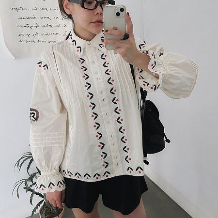A selection of Dongdaemum Women’s Shirts & Tops, showcasing the best of Korean fashion.