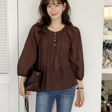 A selection of Dongdaemum Women’s Shirts & Tops, showcasing the best of Korean fashion.