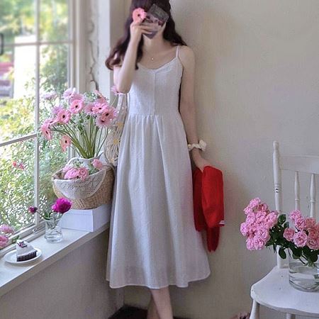 A collection of Dongdaemum Women’s Dresses, encapsulating the charm of Korean fashion.