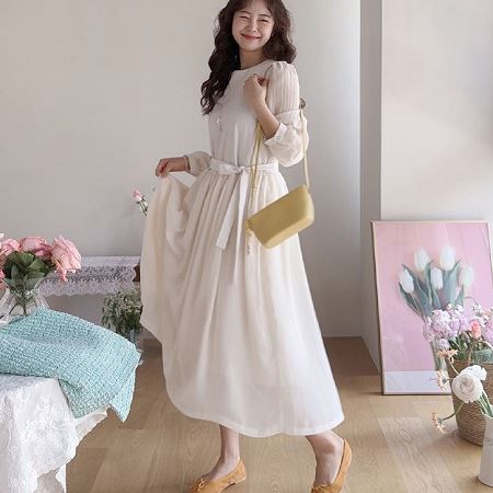 A collection of Dongdaemum Women’s Dresses, encapsulating the charm of Korean fashion.