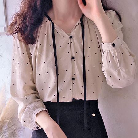 A selection of Dongdaemum Women’s Shirts & Tops, showcasing the best of Korean fashion.