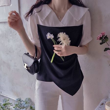 A selection of Dongdaemum Women’s Shirts & Tops, showcasing the best of Korean fashion.
