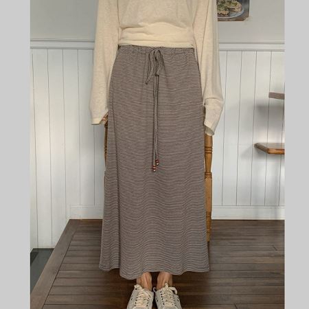 A collection of Dongdaemum Women’s Dresses, encapsulating the charm of Korean fashion.