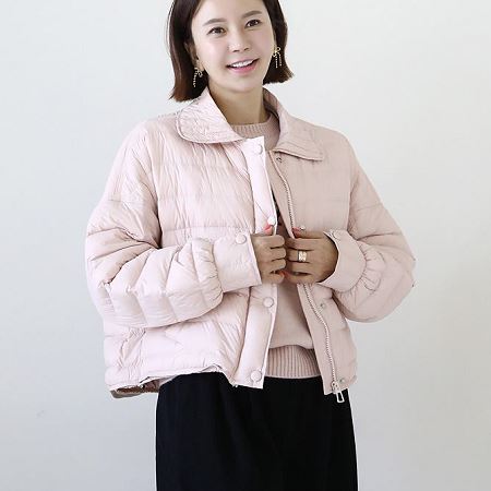 A variety of Dongdaemum Women’s Coats & Jackets, reflecting the sophistication of Korean fashion.