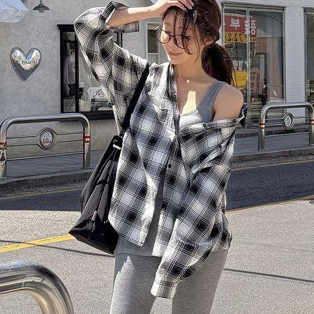 A selection of Dongdaemum Women’s Shirts & Tops, showcasing the best of Korean fashion.