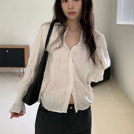 A selection of Dongdaemum Women’s Shirts & Tops, showcasing the best of Korean fashion.