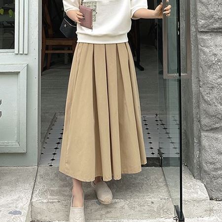 A collection of Dongdaemum Women’s Dresses, encapsulating the charm of Korean fashion.