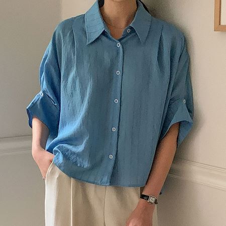 Dongdaemum Women’s Shirts, Tops & T-Shirts, a testament to the elegance and quality of wholesale Korean fashion.