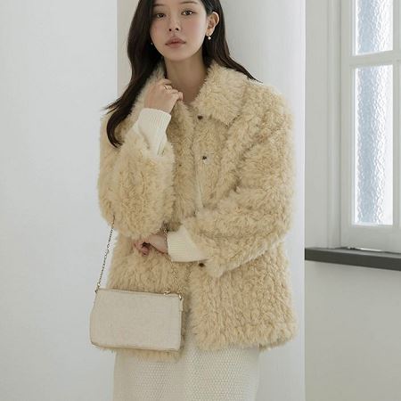 A variety of Dongdaemum Women’s Coats & Jackets, reflecting the sophistication of Korean fashion.