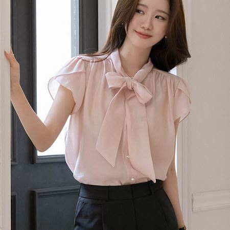 A selection of Dongdaemum Women’s Shirts & Tops, showcasing the best of Korean fashion.
