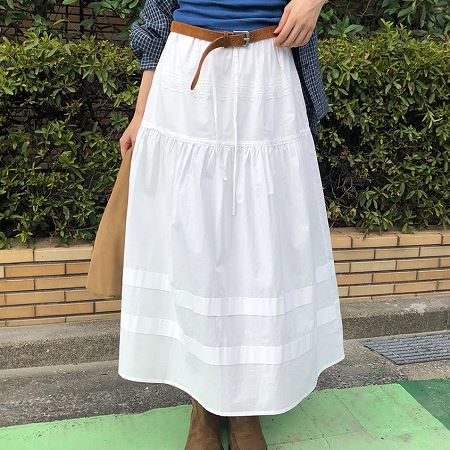 A collection of Dongdaemum Women’s Dresses, encapsulating the charm of Korean fashion.