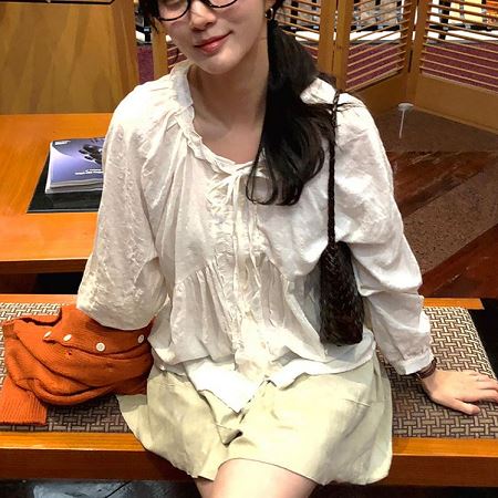 A selection of Dongdaemum Women’s Shirts & Tops, showcasing the best of Korean fashion.