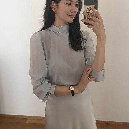 A selection of Dongdaemum Women’s Shirts & Tops, showcasing the best of Korean fashion.