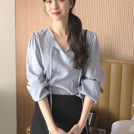 A selection of Dongdaemum Women’s Shirts & Tops, showcasing the best of Korean fashion.