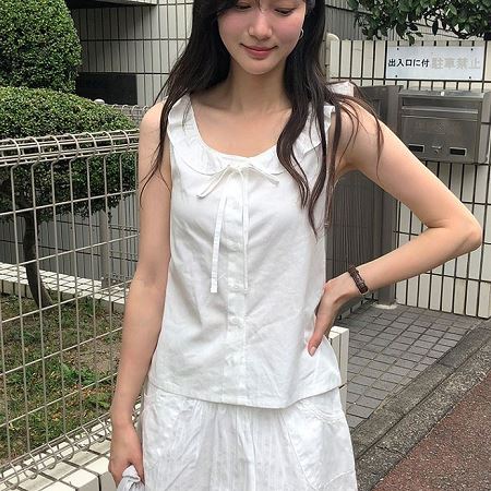 A selection of Dongdaemum Women’s Shirts & Tops, showcasing the best of Korean fashion.