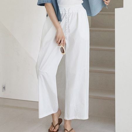 An array of Dongdaemum Women’s Pants, embodying the versatility of Korean fashion.