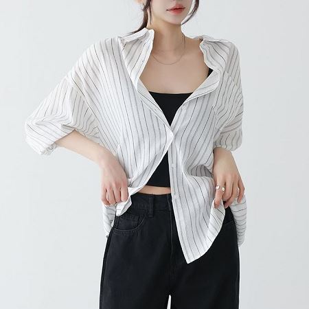 A selection of Dongdaemum Women’s Shirts & Tops, showcasing the best of Korean fashion.