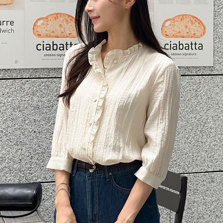 Dongdaemum Women’s Shirts, Tops & T-Shirts, a testament to the elegance and quality of wholesale Korean fashion.
