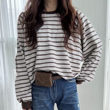 Dongdaemum Women’s Shirts, Tops & T-Shirts, a testament to the elegance and quality of wholesale Korean fashion.