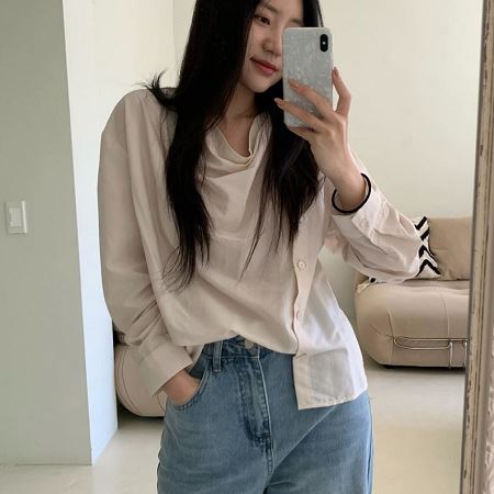 Dongdaemum Women’s Shirts, Tops & T-Shirts, a testament to the elegance and quality of wholesale Korean fashion.