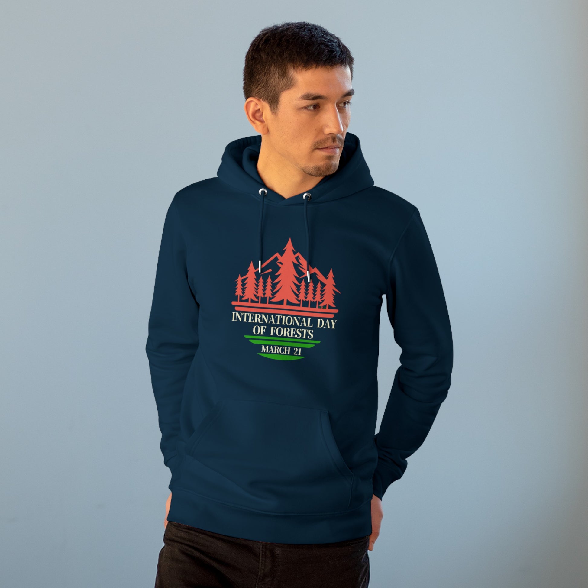 International Day of Forests, Model wearing a GR@ON Hoodie made from organic cotton, featuring a stylish and sustainable design. GR@ON Hoodies: Sustainable warmth, stylish comfort.