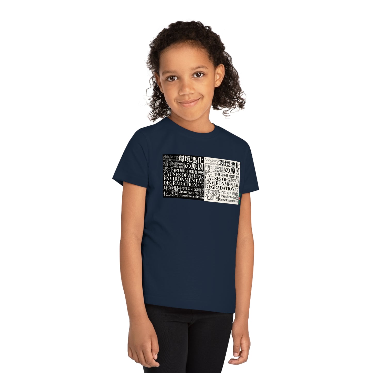 Child wearing a GR@ON Kids T-Shirt made from organic cotton, featuring a fun and colorful design. GR@ON Kids T-Shirts: Sustainable style, fun designs.