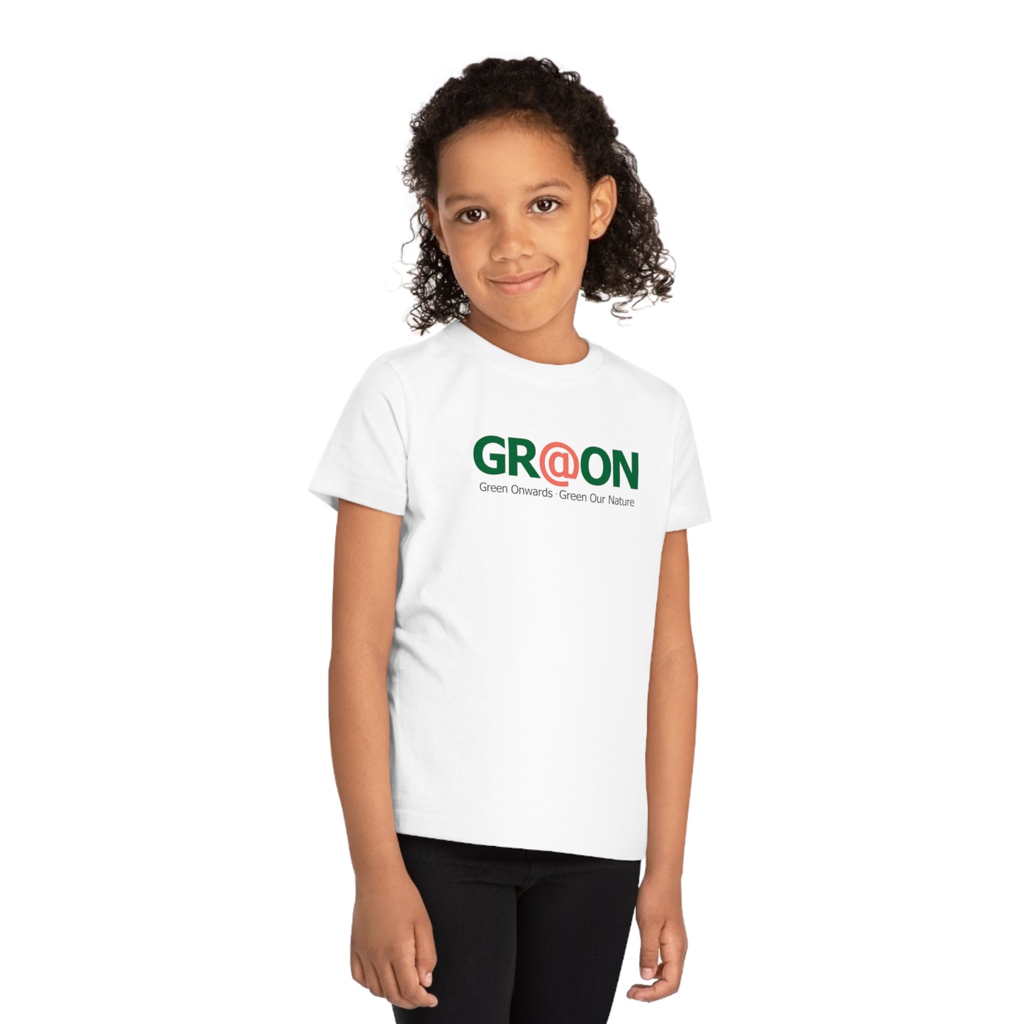 Child wearing a GR@ON Kids T-Shirt made from organic cotton, featuring a fun and colorful design. GR@ON Kids T-Shirts: Sustainable style, fun designs.