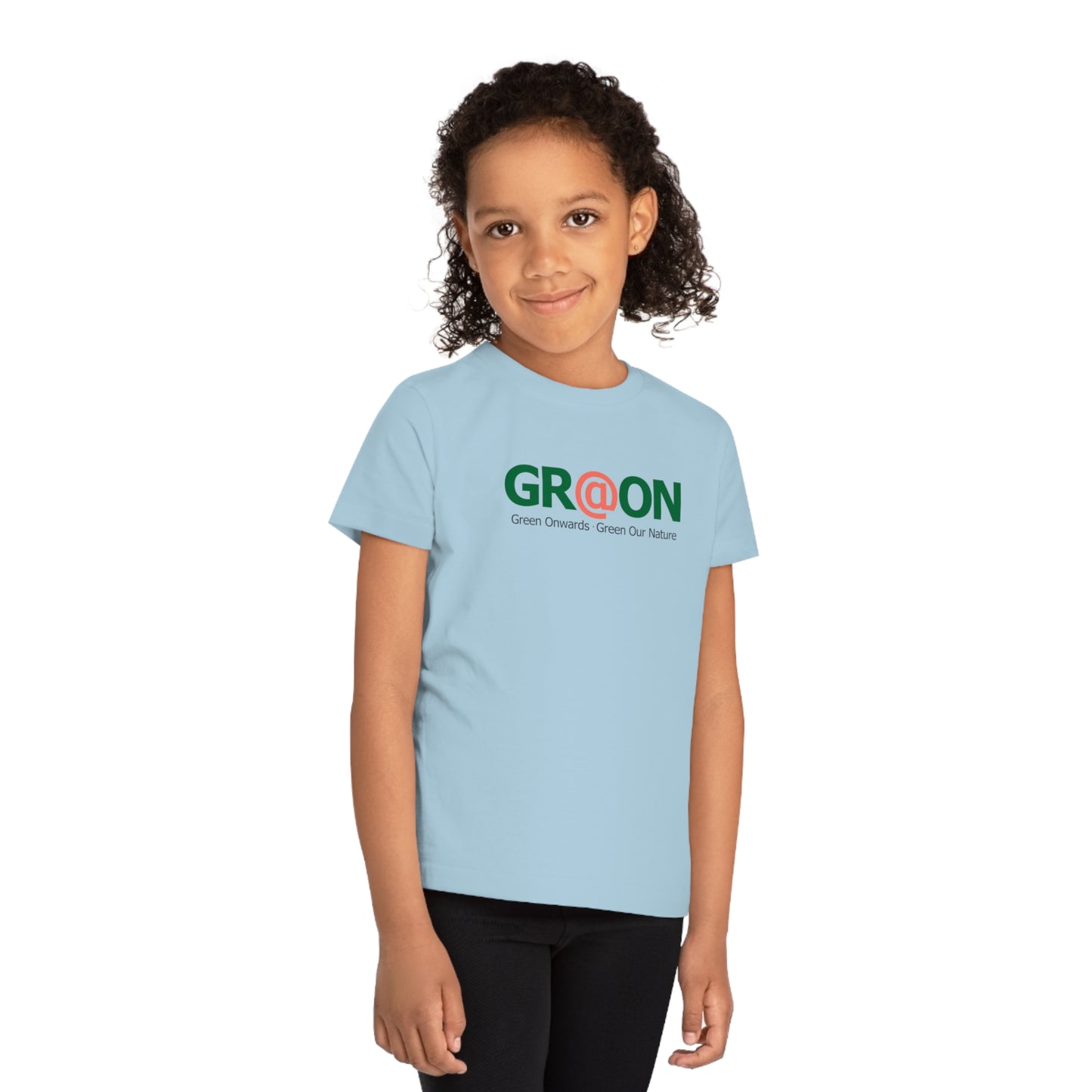 Child wearing a GR@ON Kids T-Shirt made from organic cotton, featuring a fun and colorful design. GR@ON Kids T-Shirts: Sustainable style, fun designs.