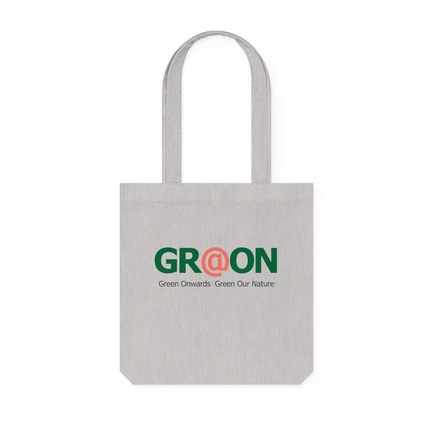 Person carrying a GR@ON Tote Bag made from organic cotton, filled with everyday essentials. GR@ON Tote Bags: Sustainable style, everyday essentials.