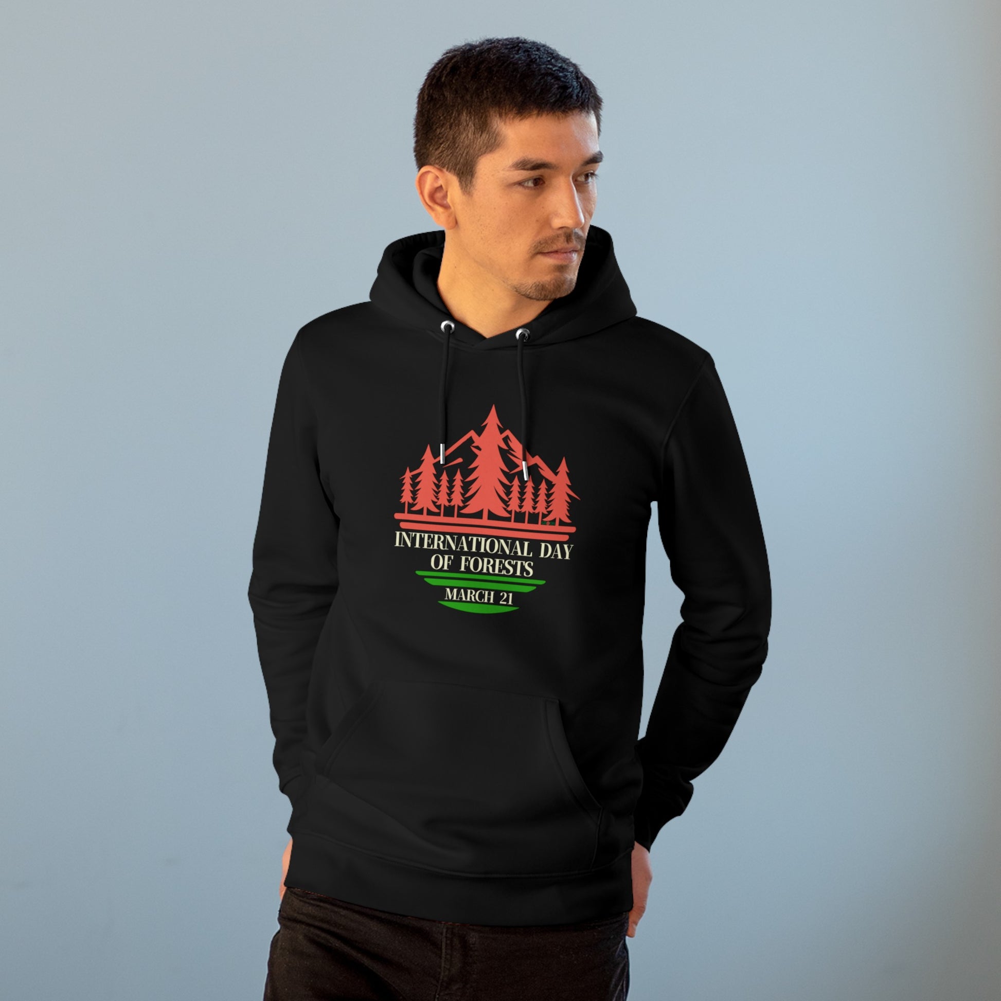 International Day of Forests, Model wearing a GR@ON Hoodie made from organic cotton, featuring a stylish and sustainable design. GR@ON Hoodies: Sustainable warmth, stylish comfort.