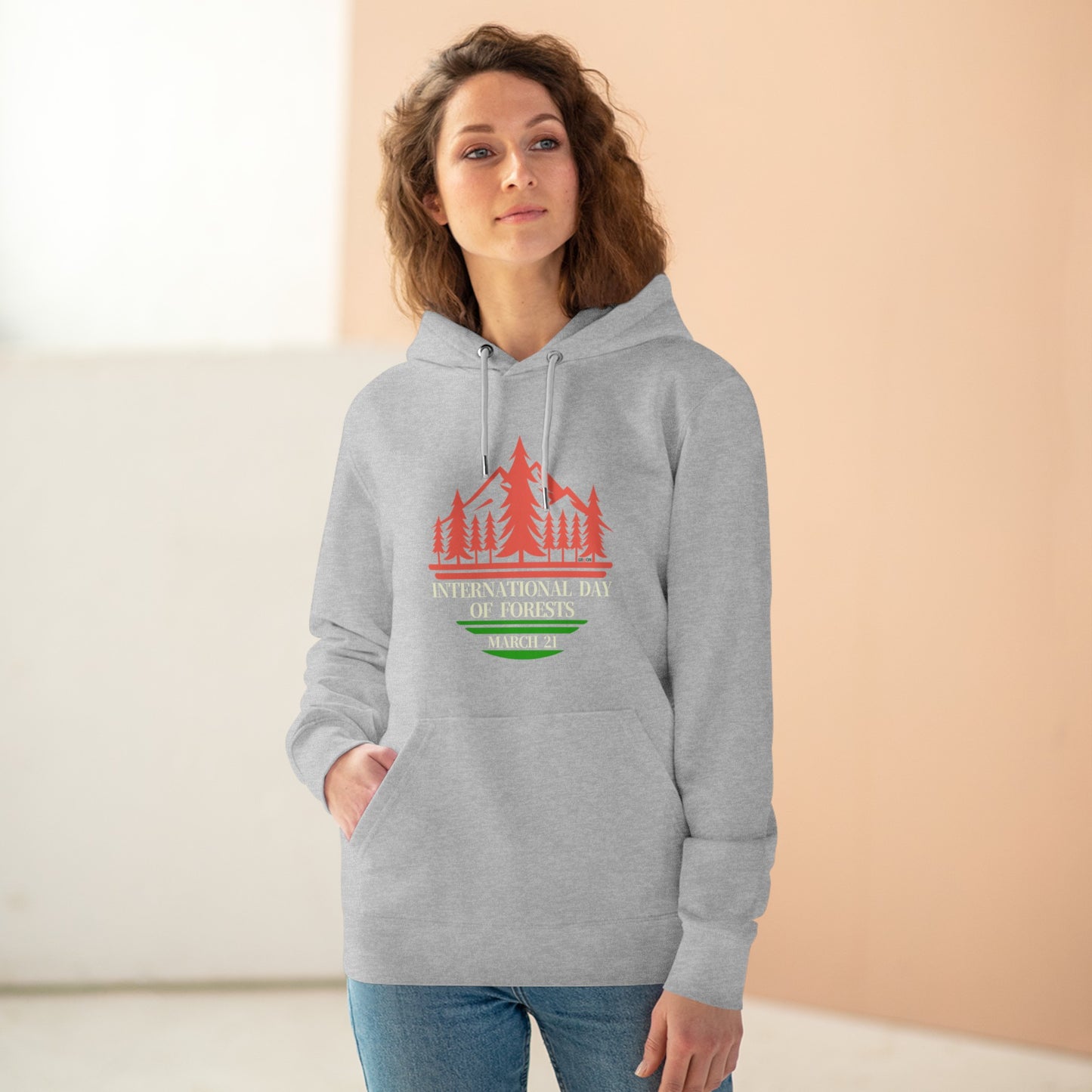 International Day of Forests, Model wearing a GR@ON Hoodie made from organic cotton, featuring a stylish and sustainable design. GR@ON Hoodies: Sustainable warmth, stylish comfort.