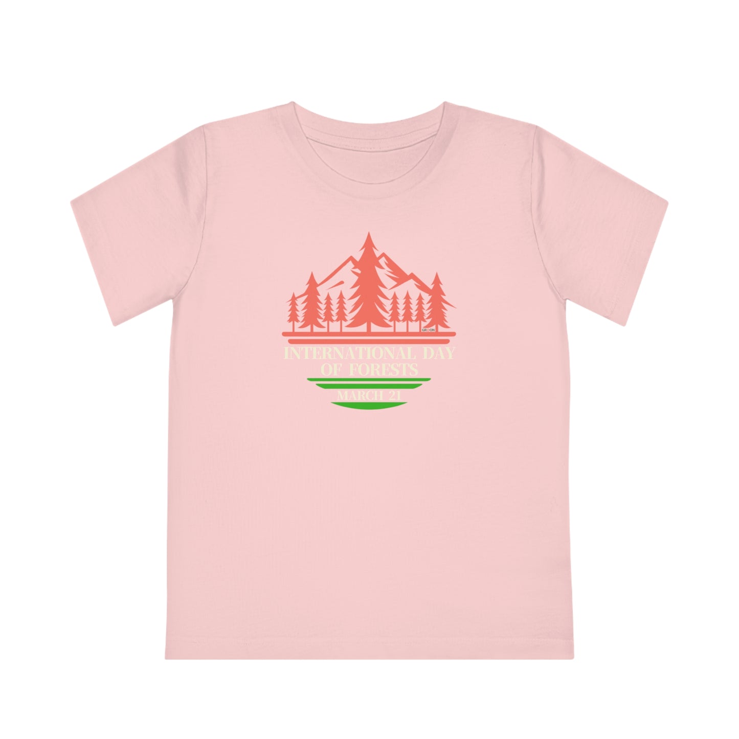 International Day of Forests, Child wearing a GR@ON Kids T-Shirt made from organic cotton, featuring a fun and colorful design. GR@ON Kids T-Shirts: Sustainable style, fun designs.