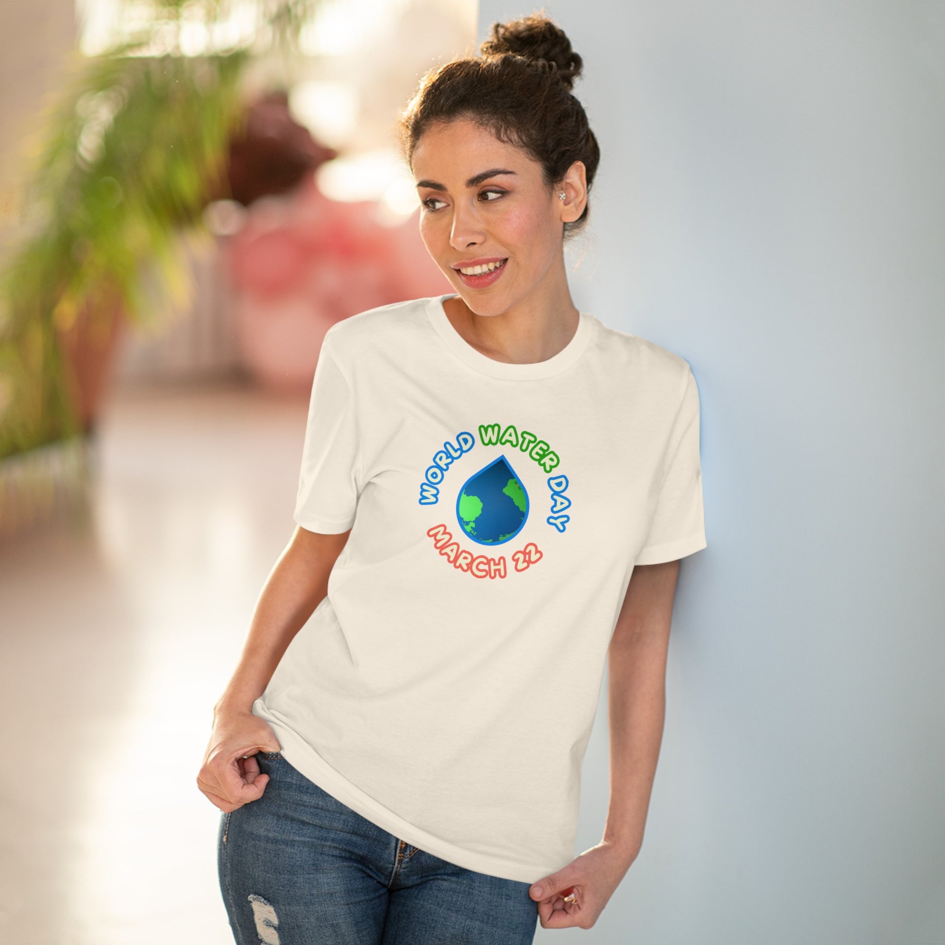 World Water Day, Model wearing a GR@ON T-Shirt made from organic cotton, featuring a stylish and sustainable design. GR@ON T-Shirts: Sustainable style, everyday comfort.