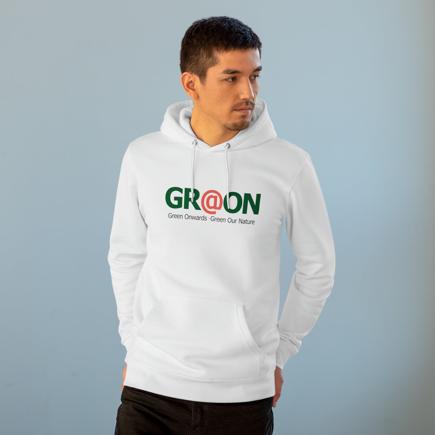 Model wearing a GR@ON Hoodie made from organic cotton, featuring a stylish and sustainable design. GR@ON Hoodies: Sustainable warmth, stylish comfort.