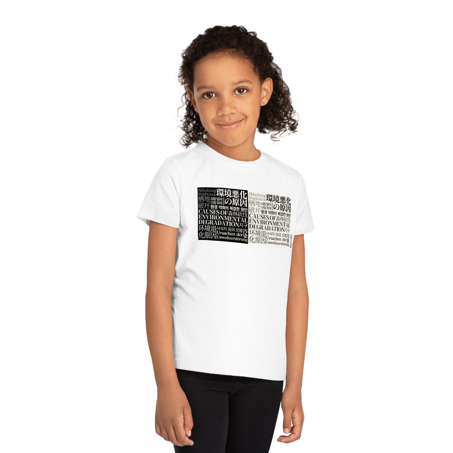 Child wearing a GR@ON Kids T-Shirt made from organic cotton, featuring a fun and colorful design. GR@ON Kids T-Shirts: Sustainable style, fun designs.