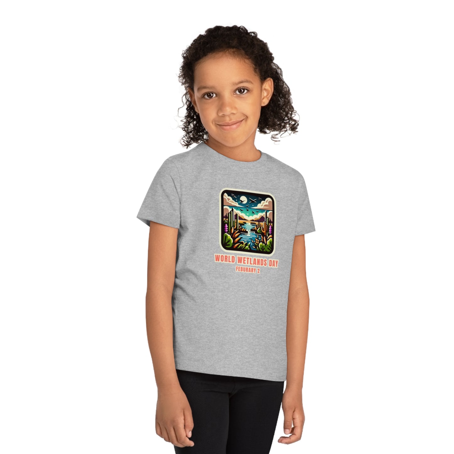 World Wetlands Day, Child wearing a GR@ON Kids T-Shirt made from organic cotton, featuring a fun and colorful design. GR@ON Kids T-Shirts: Sustainable style, fun designs.