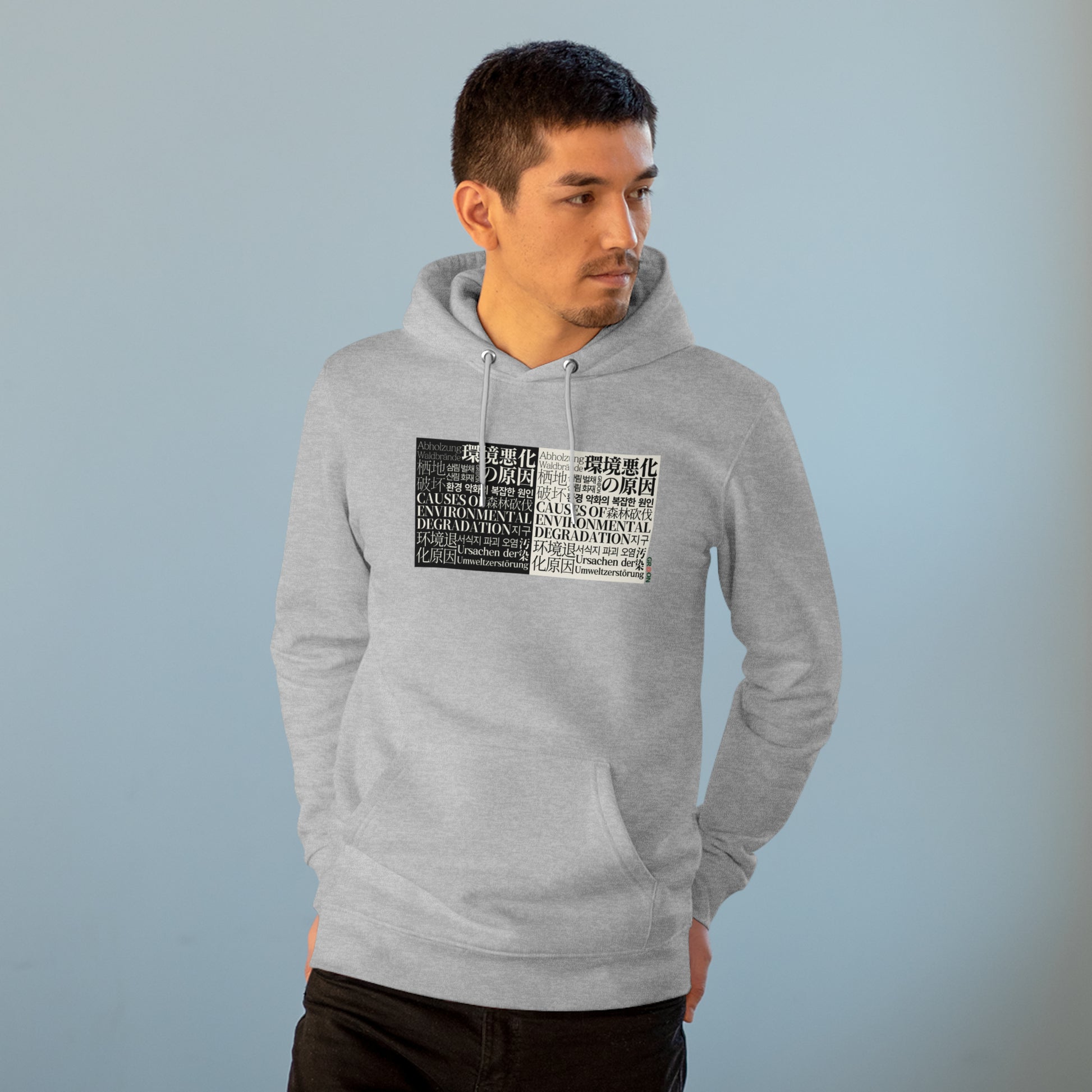 Model wearing a GR@ON Hoodie made from organic cotton, featuring a stylish and sustainable design. GR@ON Hoodies: Sustainable warmth, stylish comfort.