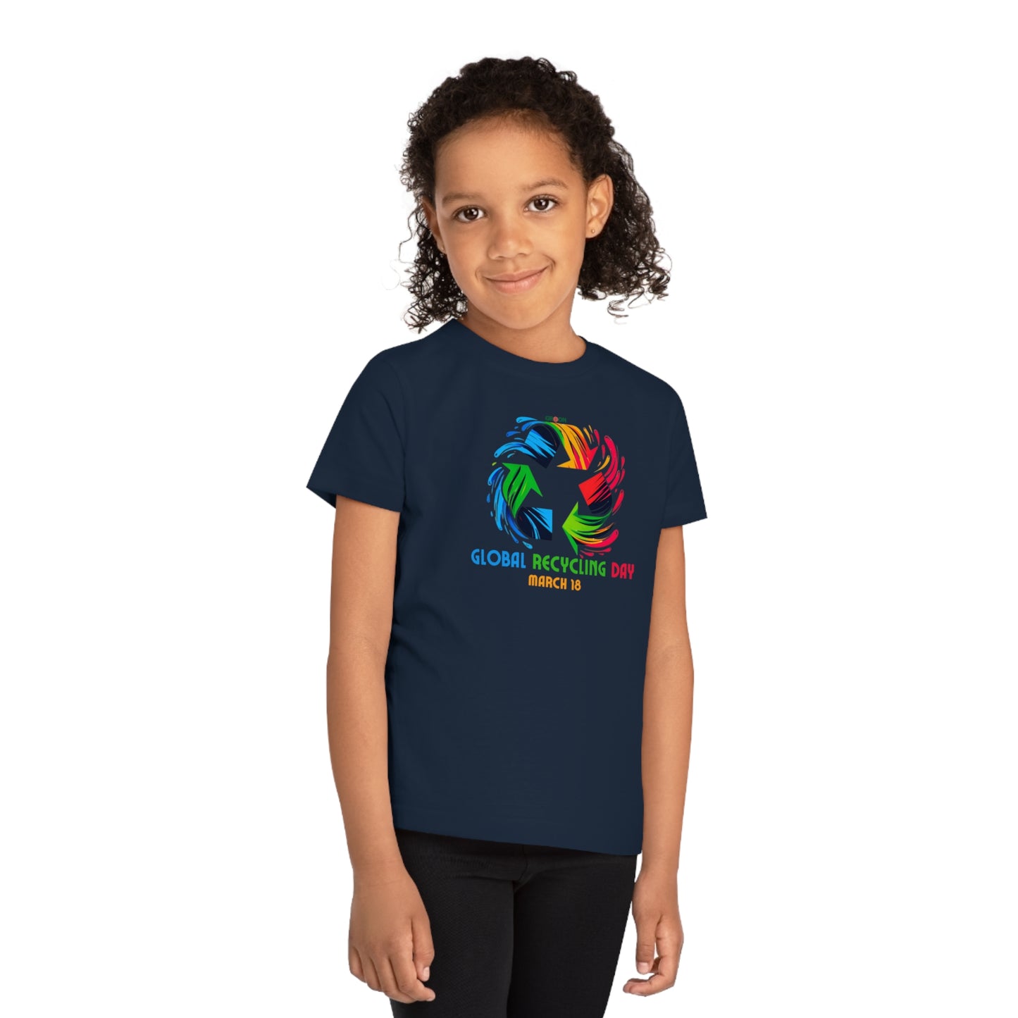 Global Recycling Day, Child wearing a GR@ON Kids T-Shirt made from organic cotton, featuring a fun and colorful design. GR@ON Kids T-Shirts: Sustainable style, fun designs.