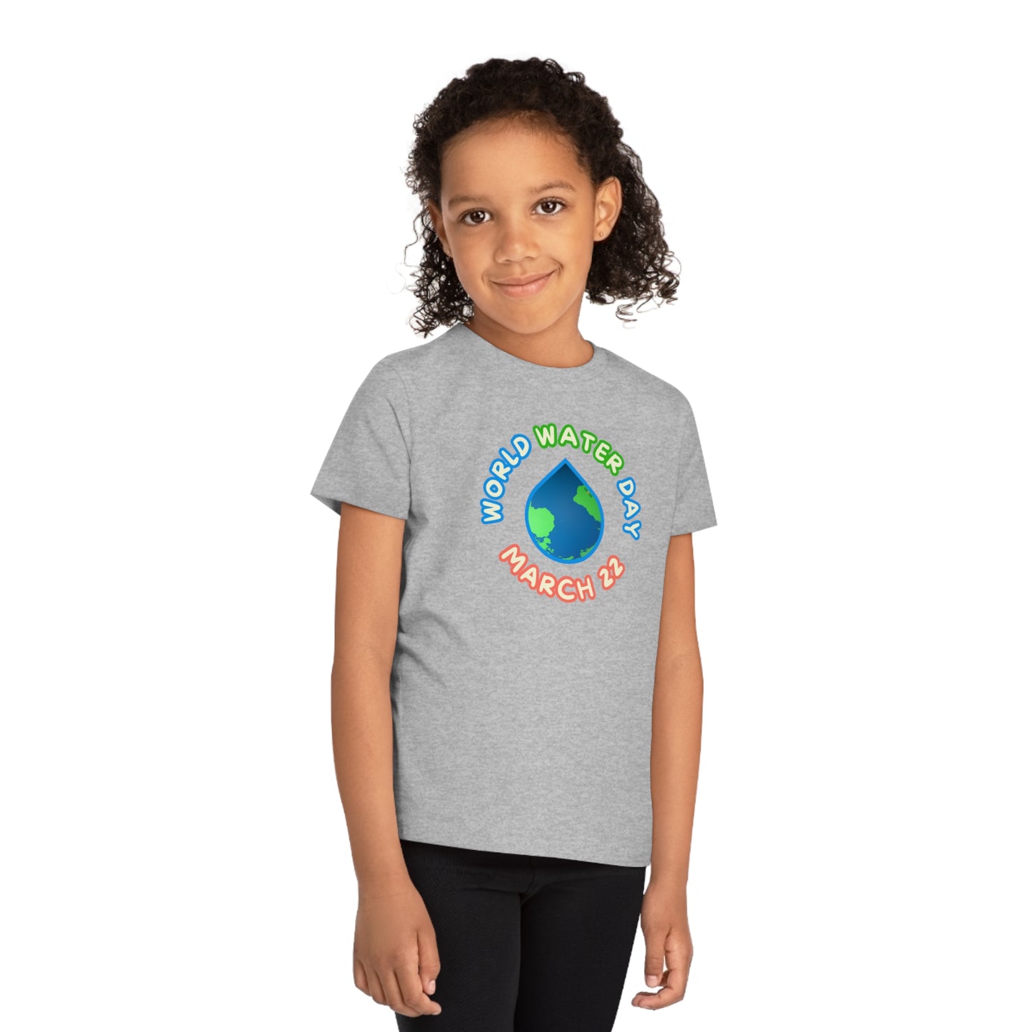 World Water Day, Child wearing a GR@ON Kids T-Shirt made from organic cotton, featuring a fun and colorful design. GR@ON Kids T-Shirts: Sustainable style, fun designs.