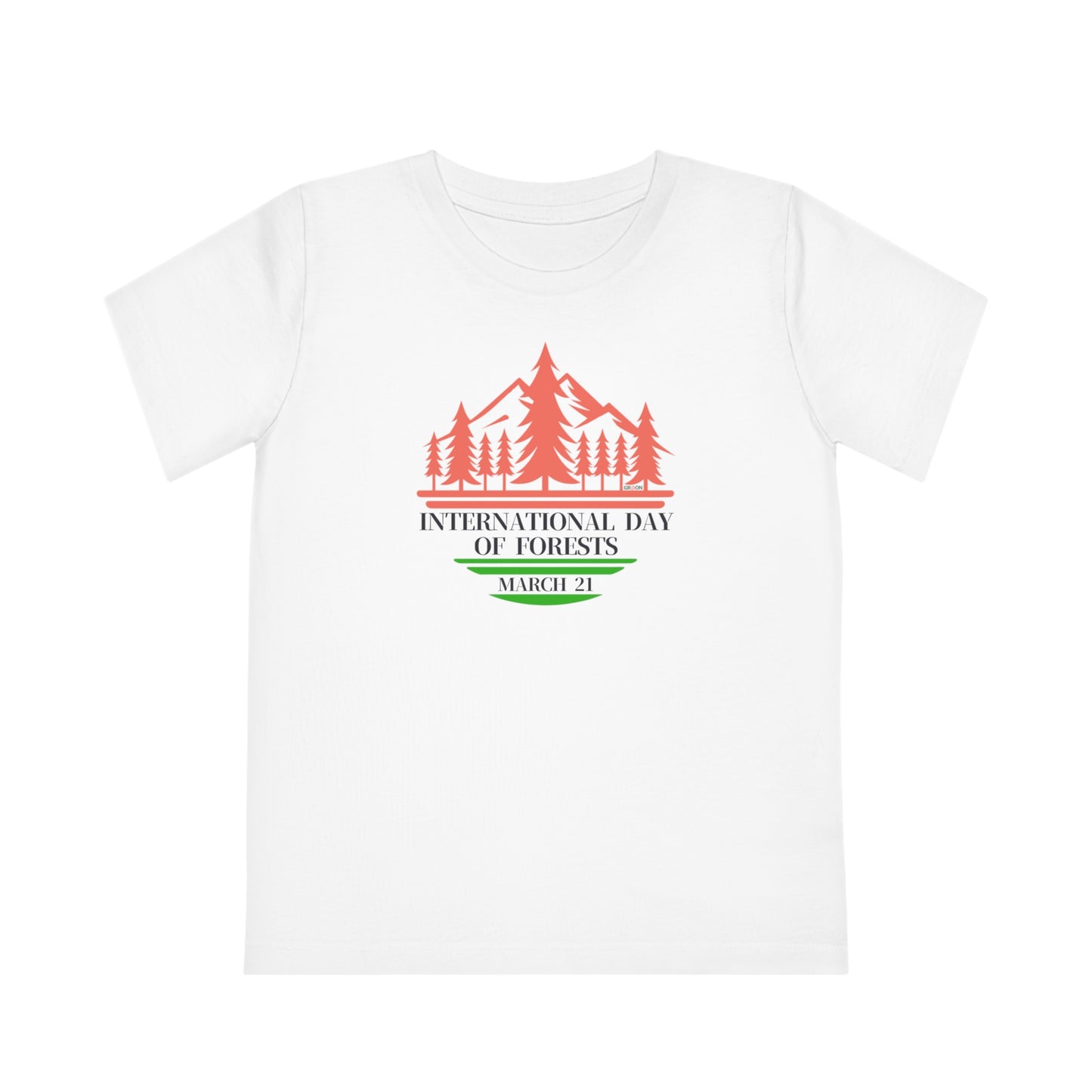 International Day of Forests, Child wearing a GR@ON Kids T-Shirt made from organic cotton, featuring a fun and colorful design. GR@ON Kids T-Shirts: Sustainable style, fun designs.