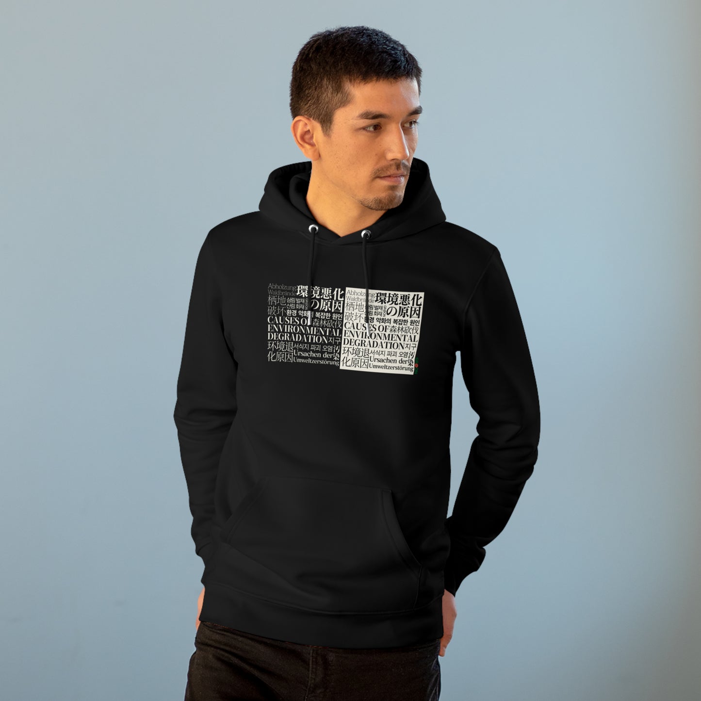 Model wearing a GR@ON Hoodie made from organic cotton, featuring a stylish and sustainable design. GR@ON Hoodies: Sustainable warmth, stylish comfort.