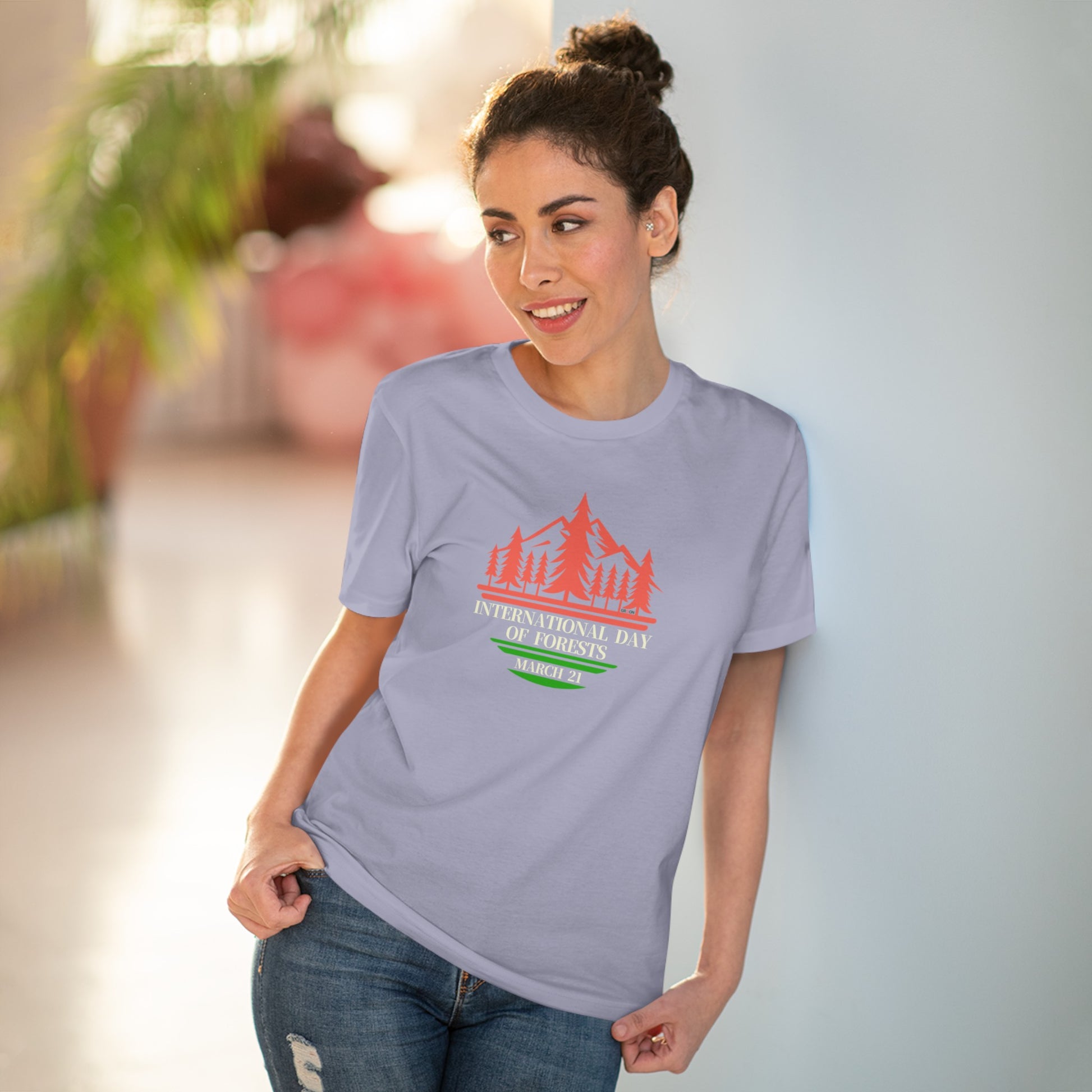 International Day of Forests, Model wearing a GR@ON T-Shirt made from organic cotton, featuring a stylish and sustainable design. GR@ON T-Shirts: Sustainable style, everyday comfort.